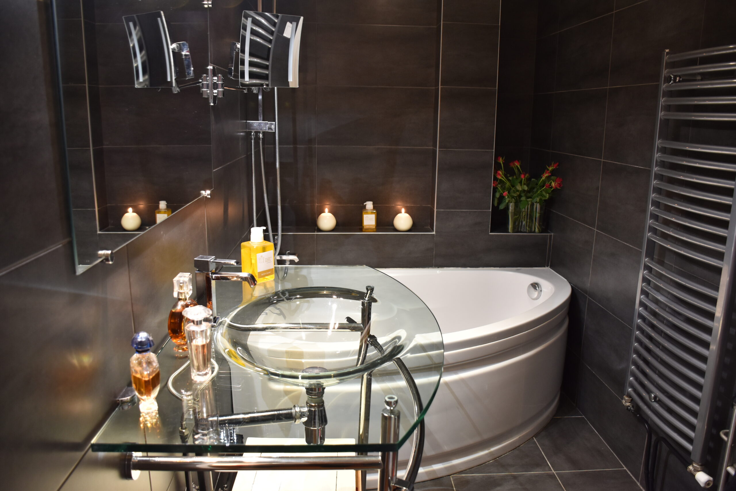 Rue de Paradis - bathroom with a bathtub sink & shower